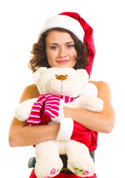 Beautiful young woman in Santa Claus clothes with white bear — Stock Photo, Image