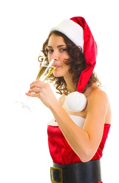 Женщина в одежде Деда Мороза с бокалом шампанского — стоковое фото