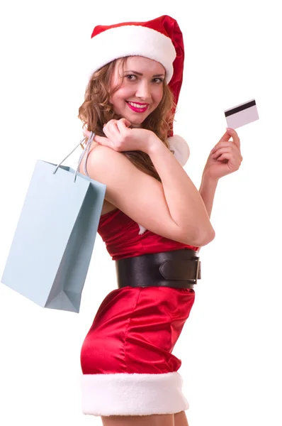 Женщина в одежде Деда Мороза с кредитной картой — стоковое фото