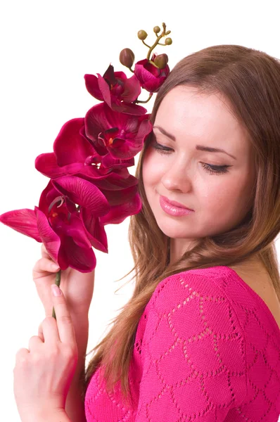 Krásná mladá dívka s orchidejí — Stock fotografie