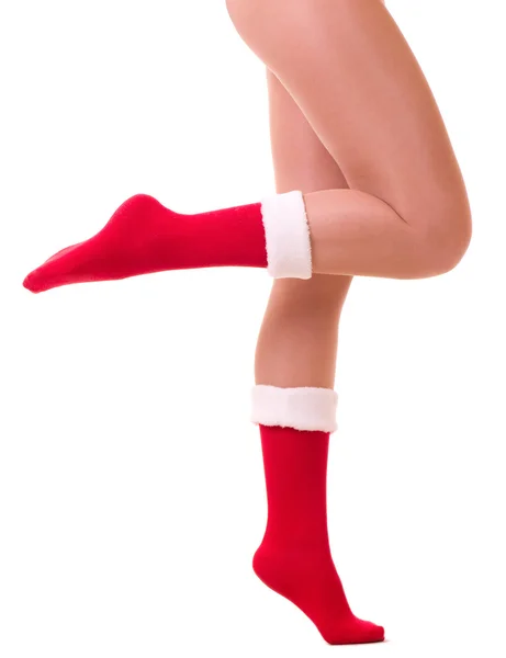 Sexy pernas na meia de Papai Noel isolado — Fotografia de Stock