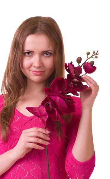 Young girl with orchid on white background. — Stock Photo, Image