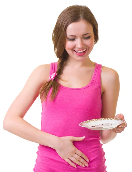The beautiful young woman with plate — Stock Photo, Image