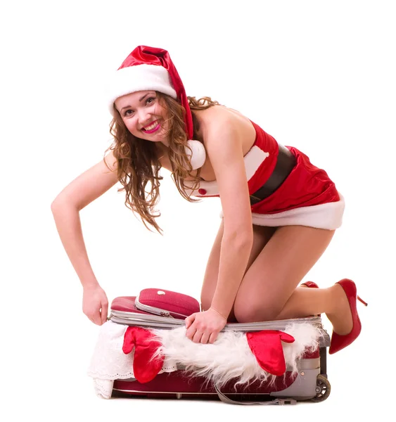 Woman in Santa Claus clothes dreaming about vacation — Stock Photo, Image