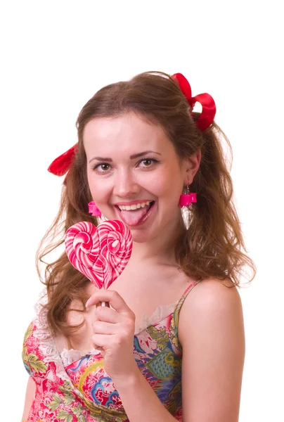 粉色螺旋棒棒糖的漂亮年轻女孩 — 图库照片