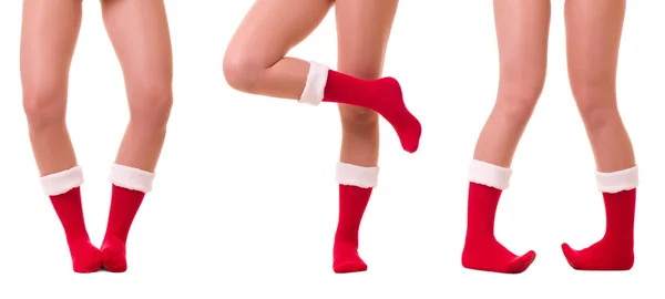 Sexy nogi w Santa Claus skarpety na białym tle — Zdjęcie stockowe