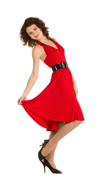 Kırmızı elbiseli seksi genç kadın. — Stok fotoğraf