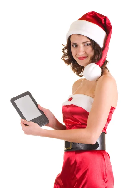 Menina em roupas de Papai Noel com notebook — Fotografia de Stock