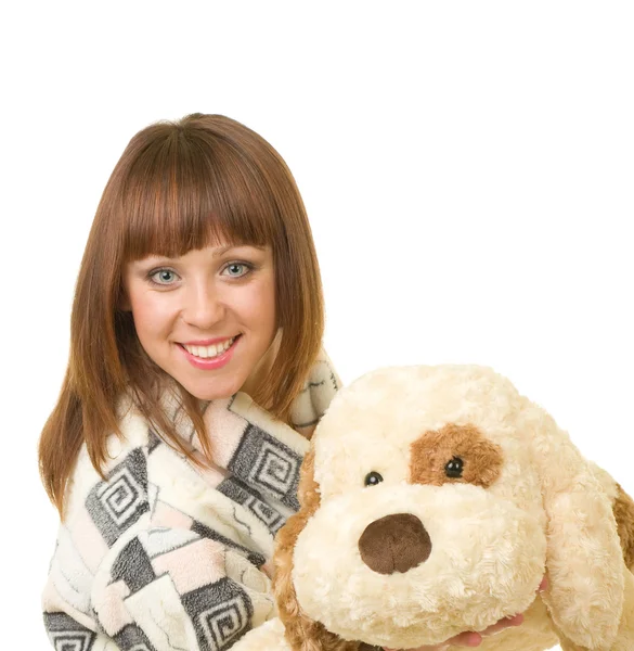 Beautiful young girl with toy dog — Stock Photo, Image