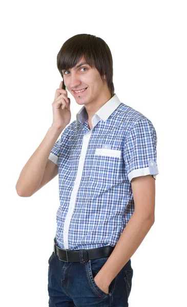 Ung man svara på telefonen — Stockfoto
