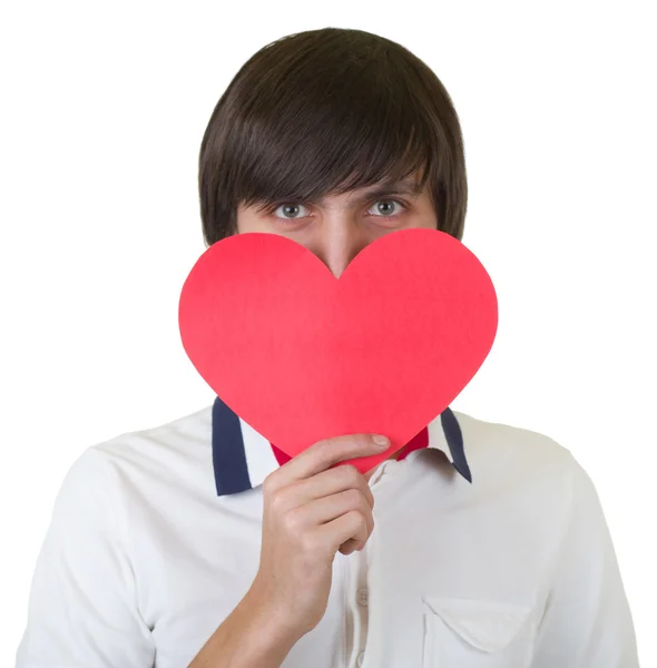 Mladý muž s červeným srdcem — Stock fotografie