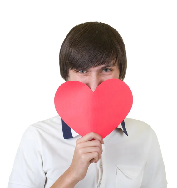 Young man holding red heart — Stock Photo, Image