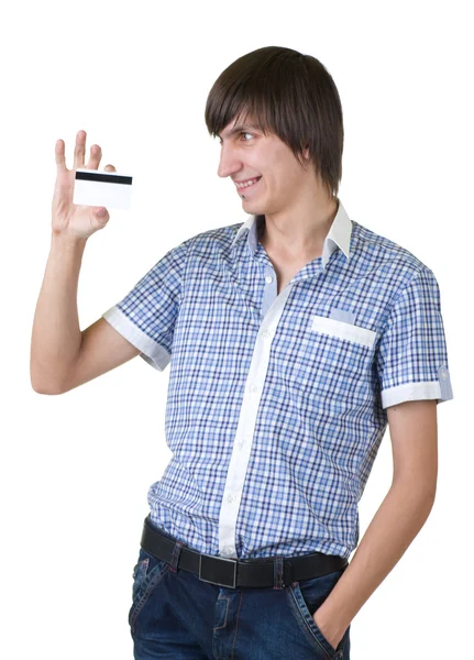 Jeune homme heureux tenant carte de crédit — Photo
