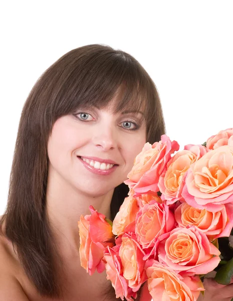 Mladá krásná žena s růžovými růžemi — Stock fotografie