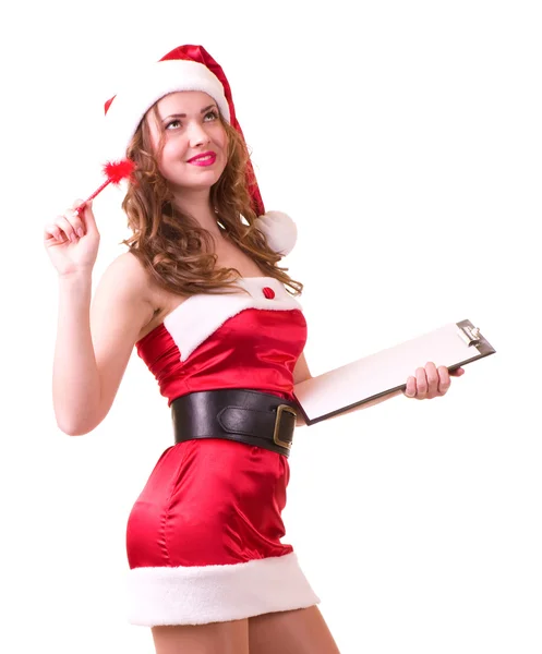 Vrouw in santa claus kleren leunend op een leeg bord — Stockfoto