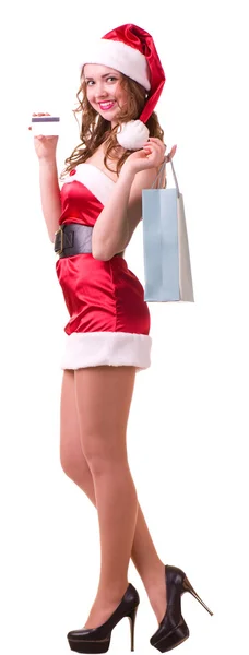 用信用卡的圣诞老人衣服的女人 — 图库照片