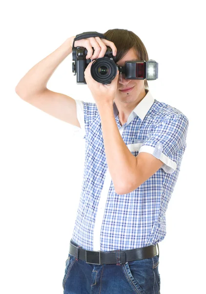 Joven fotógrafo hombre haciendo fotos por cámara digital —  Fotos de Stock