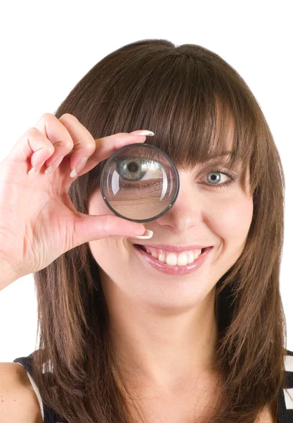 Young woman with magnifying glass — Stock Photo, Image