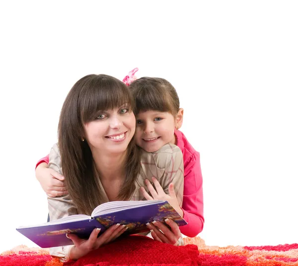 Mother and daughter reading a book — Stock Photo, Image