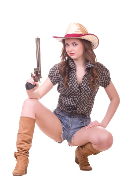 Menina bonita com chapéu de cowboy com revólver — Fotografia de Stock