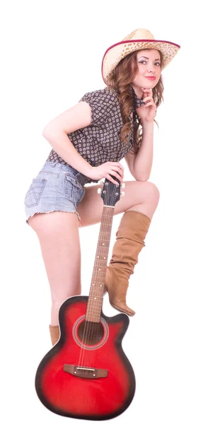 Красивая девушка в ковбойской шляпе с Гита — стоковое фото