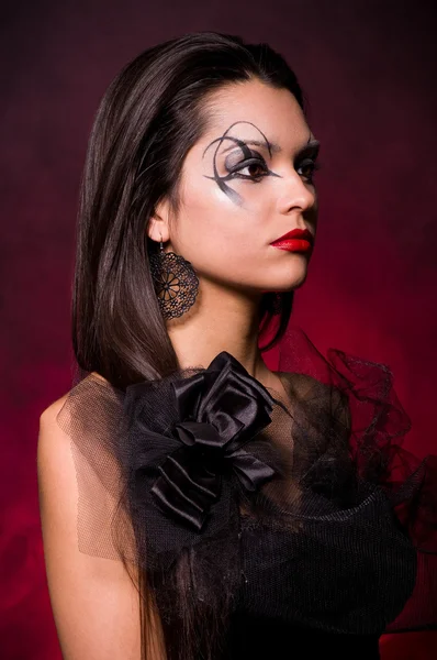 Portrait of a beautiful lady with art makeup — Stock Photo, Image