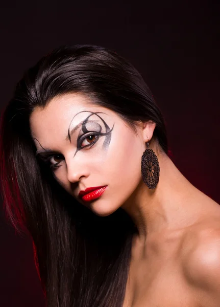 Portrait of a beautiful lady with art makeup — Stock Photo, Image