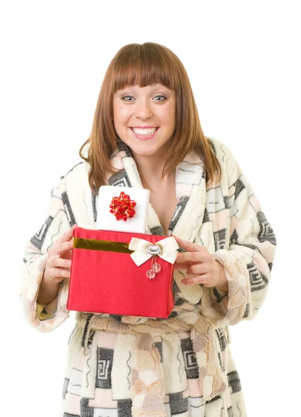Девушка в плюшевом халате с подарками — стоковое фото
