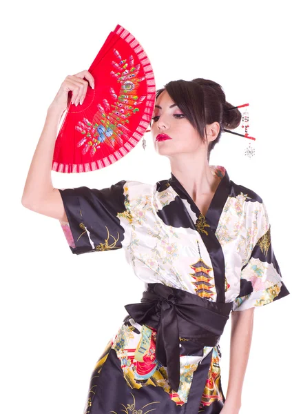 Kvinna i asiatiska kostym med röda asiatiska fläkt — Stockfoto