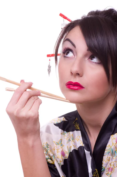 stock image Young woman in Japanese kimono with chopsticks
