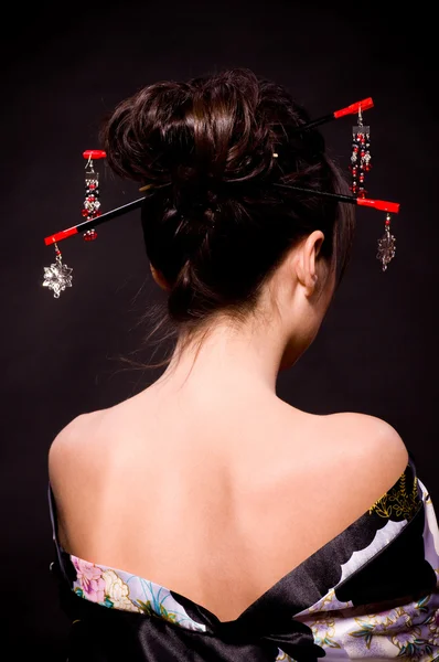 Mujer en traje asiático — Foto de Stock