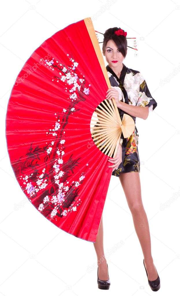 Woman in Asian costume with red Asian fan