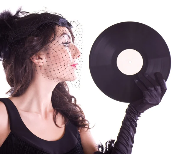 Kvinna i retrostil med vinyl platta — Stockfoto