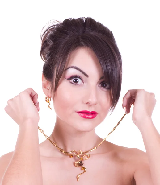 Kvinna med gyllene smycken — Stockfoto