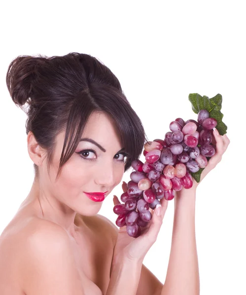 Beautiful young woman with red grape — Stock Photo, Image