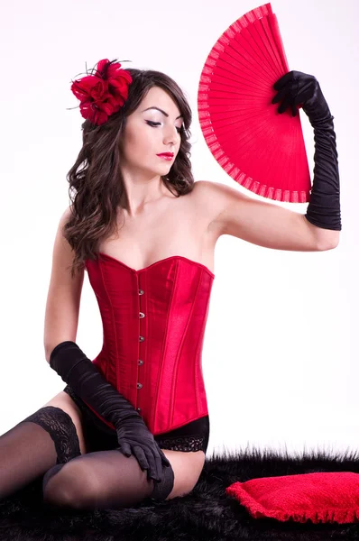Sexy jovem mulher no preto vermelho espartilho — Fotografia de Stock