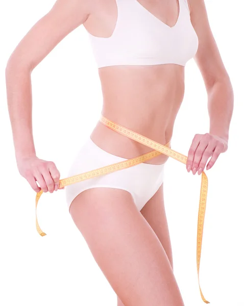 Yellow measure on beautiful woman body — Stock Photo, Image