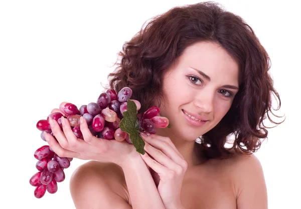 Bella giovane donna con uva rossa — Foto Stock