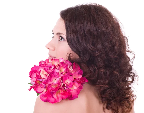 Beauty face of the young woman with flower — Stock Photo, Image