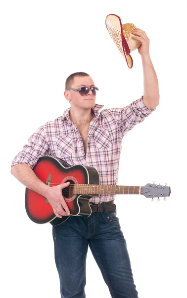 Hezký muž s kovbojský klobouk s kytarou — Stock fotografie