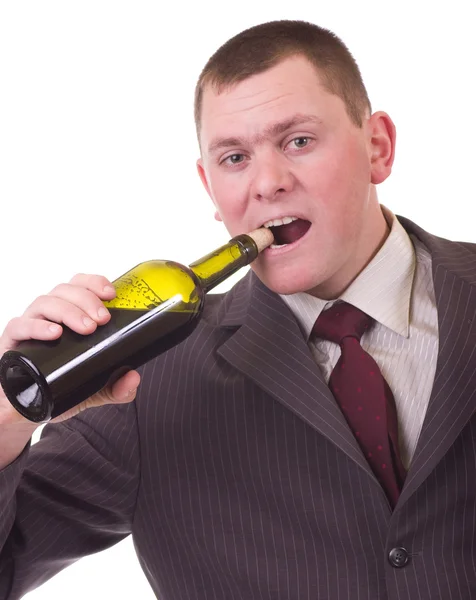 Krásný mladík s lahví vína — Stock fotografie