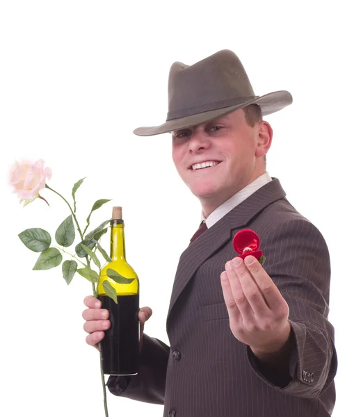 Man with flowers and gift — Stock Photo, Image