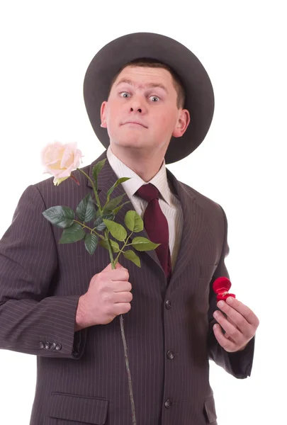 Man with flowers and gift — Stock Photo, Image