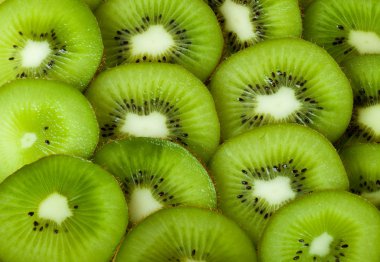 Healthy food background with beautiful green kiwi clipart
