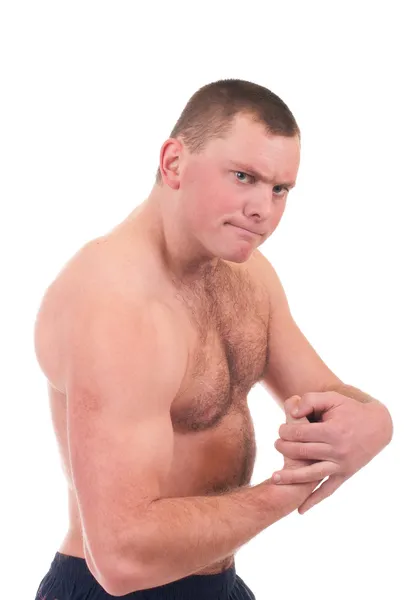 Молодий чоловік з м'язистим тілом на білому тлі . — стокове фото