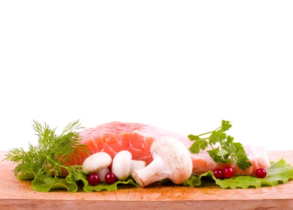 Piece of a salmon with mushrooms — Stock Photo, Image
