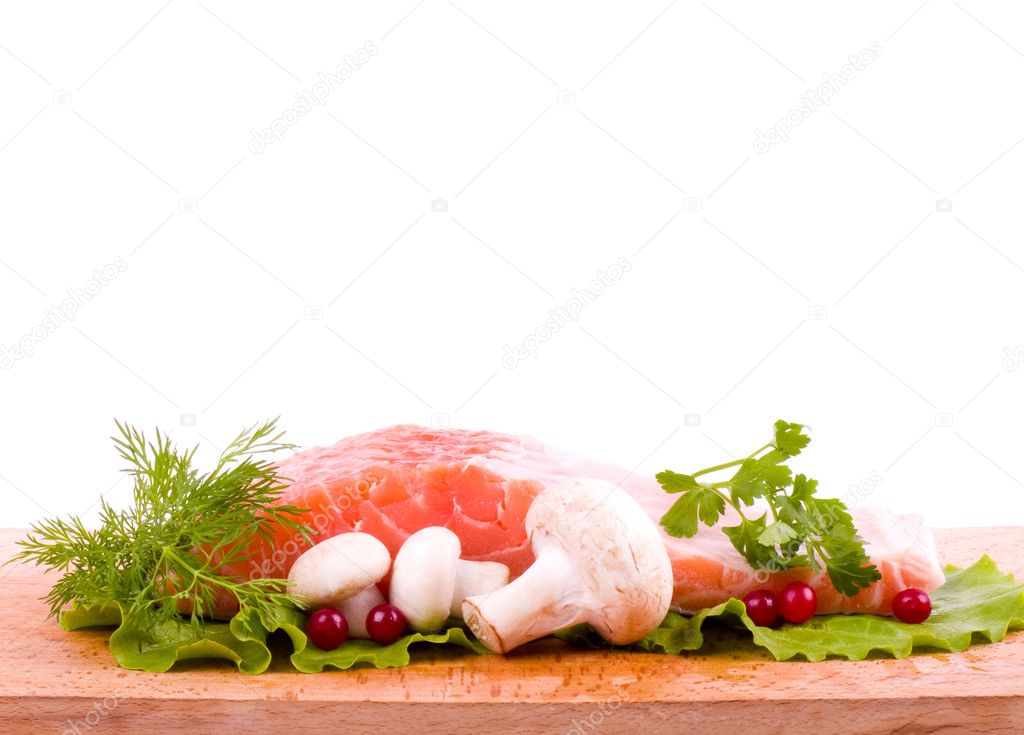 Piece of a salmon with mushrooms
