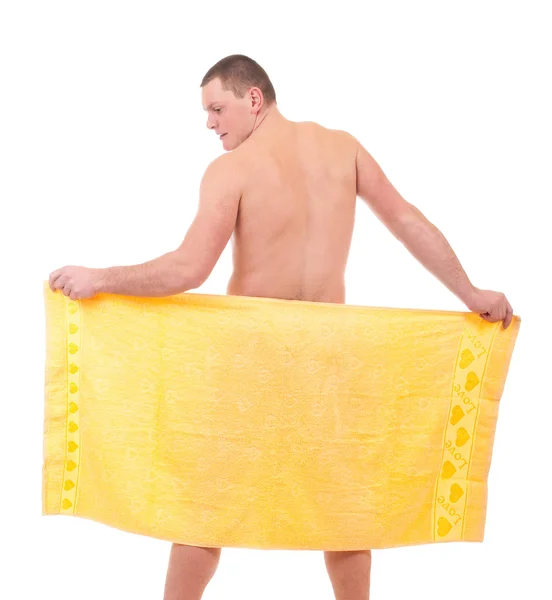 Beautiful athletic man in yellow towel — Stock Photo, Image