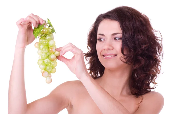 Красива молода жінка з зеленим виноградом — стокове фото