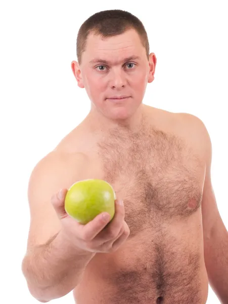 Молодий чоловік з зеленим яблуком — стокове фото